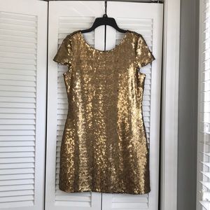 Pristine gold sequin mini dress, size medium, brand: tulle. Worn once